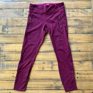 Lululemon dark pink/purple ish leggings with 2 side pockets and mesh on bottoms